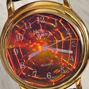 Gold-Tone Red Spider Holographic Dial Quartz Watch